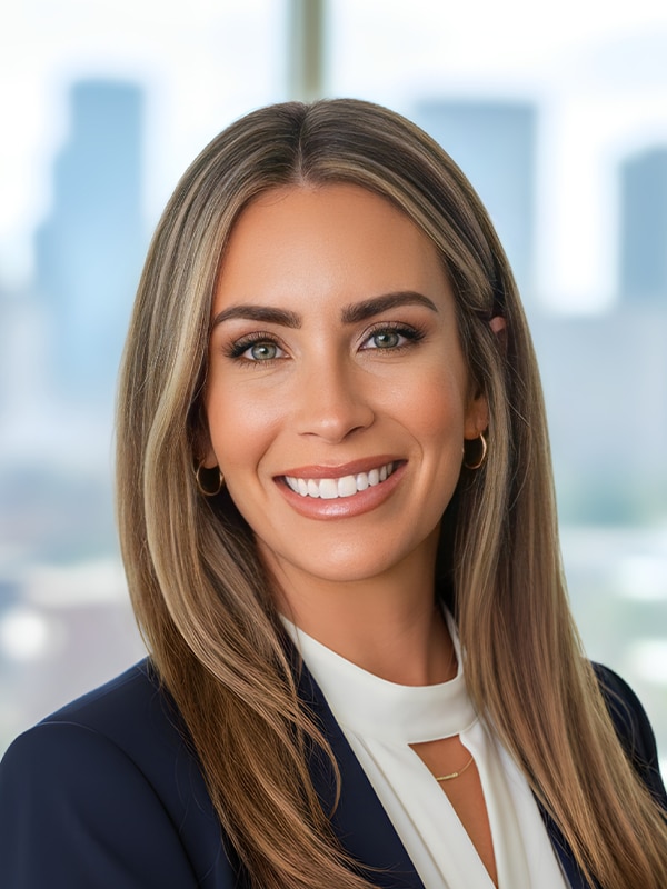 Hannah B Melton, Mortgage Loan Originator at Loan Velocity, smiling confidently in a professional setting, showcasing her commitment to client service and support in the mortgage process.